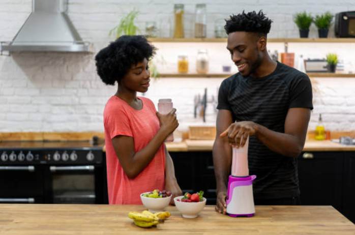 black couple eating fruits 2021